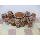 A collection of terracotta pots including named pots - some A/F