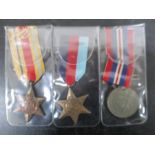 A group of three WWII medals