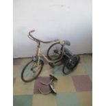 A vintage tricycle (A/F) with stabilizer training wheels