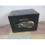 A Sentry Safe with one key. (Key in office)
