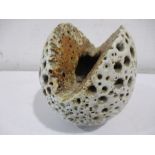 An Alan Wallwork (1931-2019) split seed pod vase with pierced decoration, 11cm height