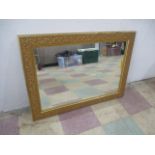 A gilt framed mirror