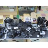 A collection of Cameras and photographic equipment