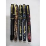 A collection of five fountain pens, including three vintage Mentmore fountain pens, a Summit