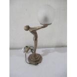 An art deco style lamp, the stem formed as a nude lady
