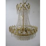 An eight light crystal chandelier