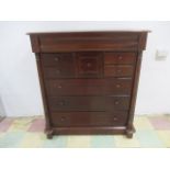 A Victorian style chest of nine drawers