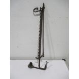 A 18th century cast iron handing rush light