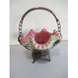 A silver plated centre piece with overlaid glass bowl