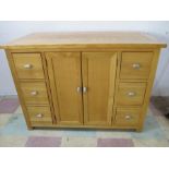 A light oak sideboard