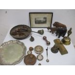 An assortment of items including a set of weights, wooden animals etc.