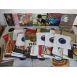 A collection of 7" vinyl singles including The Beatles Frank Sinatra, Billy Fury, Slade, Madonna,