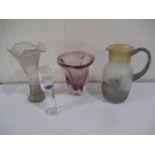 A coloured glass Murano vase, along with a glass jug with matching vase and one other.