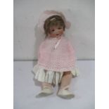 An Armand Marseille bisque headed doll (996,14) with open mouth & teeth