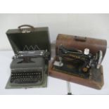 A cased Singer sewing machine, along with a Consul typewriter in carry case