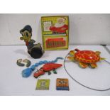 A collection of vintage children's toys including a Chad Valley Donald Duck, Tri-ang Jabberwock,