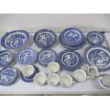 A collection of blue & white willow pattern china