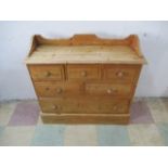 A pine chest of six drawers