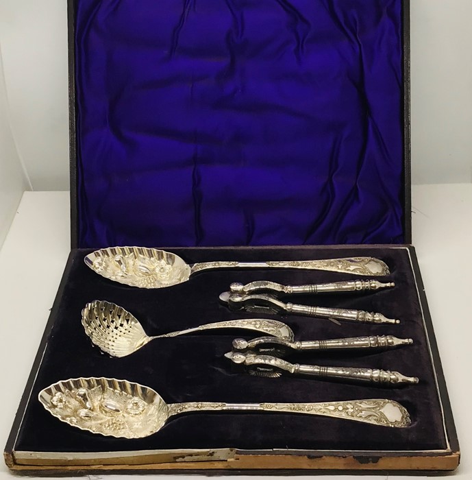 A cased set of berry spoons, sifter and nutcrackers- case A/F