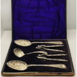A cased set of berry spoons, sifter and nutcrackers- case A/F
