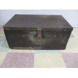 A vintage wooden trunk with a collection of various spanners and socket sets