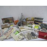 An assortment of OO gauge model railway locomotives, kits and accessories including bogies, carriage