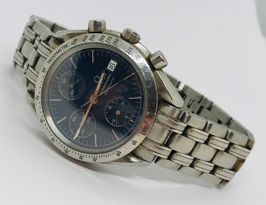 A gents Omega Speedmaster stainless steel automatic bracelet chronometer, having signed blue dial,
