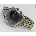 A gents Omega Speedmaster stainless steel automatic bracelet chronometer, having signed blue dial,