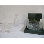 A collection of glassware including six cut glass sherry glasses, decanter and Tyrone Crystal bowl.