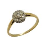An 18ct gold dress ring set with diamonds