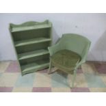 A vintage Lloyd Loom chair, along with a painted freestanding shelf