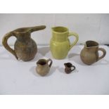 A collection of studio pottery jugs