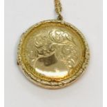 A 9ct gold back and front locket on a 9ct gold chain ( chain weight 3.1g)