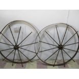 A pair of cast iron wheels- A/F