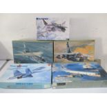 A collection of five boxed Hasegawa model planes including: F-4EJ Phantom II, L.T.V. A-7E Corsair II