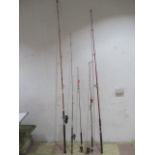 A collection of five fishing rods including three Shakespeare rods and one Silstar etc