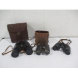 A pair of C.P Goerz (Berlin) binoculars in original leather case, along with two other pairs of