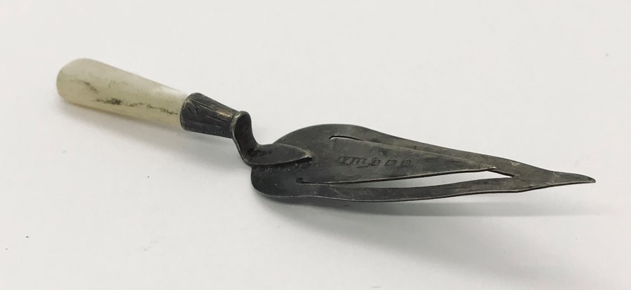 A hallmarked silver bookmark in the form of a trowel, silver lidded sugar caster, silver lid along - Image 4 of 6