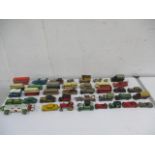 A collection of die cast model cars including Dinky, Matchbox and Lesney