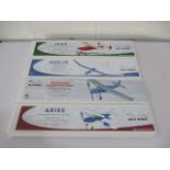 A collection of four boxed West Wings model kit planes including Jade, Aries, Merlin and De