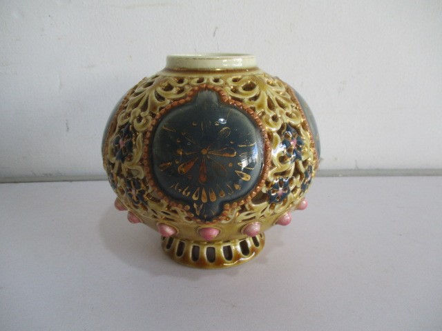 A Zsolnay reticulated small vase with gilded decoration- hairline crack to rim