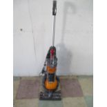 A Dyson DC24 Multi floor ball upright vacuum cleaner