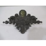 A vintage cast iron door handle