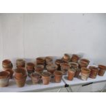 A collection of terracotta pots including named pots - some A/F