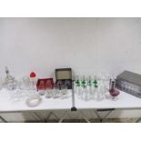 A large quantity of glassware in two boxes including tumblers, martini glasses etc.