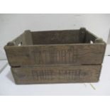 A vintage wooden apple crate, stamp marked with Tatworth Fruit Farm/Yonder Hill Sawmills - local