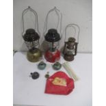 Two Tilley lamps, along with one other and accessories/spare parts