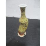 A David Melville studio pottery vase with running dry glaze, height 23cms.