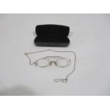 A pair of Victorian Pince-nez glasses in original case