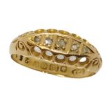 An 18ct gold 'boat style' ring with 5 diamonds